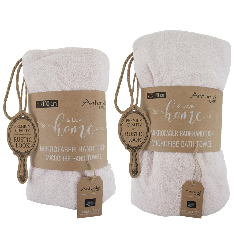 Roze microvezel handdoekenset met maten 50×100 cm en 70×140 cm; superzacht, lichtgewicht en sneldrogend.