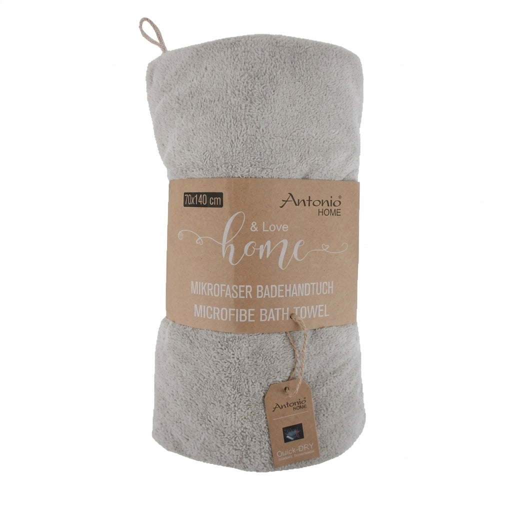Roze microvezel handdoek van 70×140 cm; superzacht, lichtgewicht en sneldrogend.