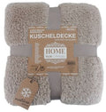 Beige teddy deken van 150×200 cm; superzacht, warm en fluffy voorkant. 