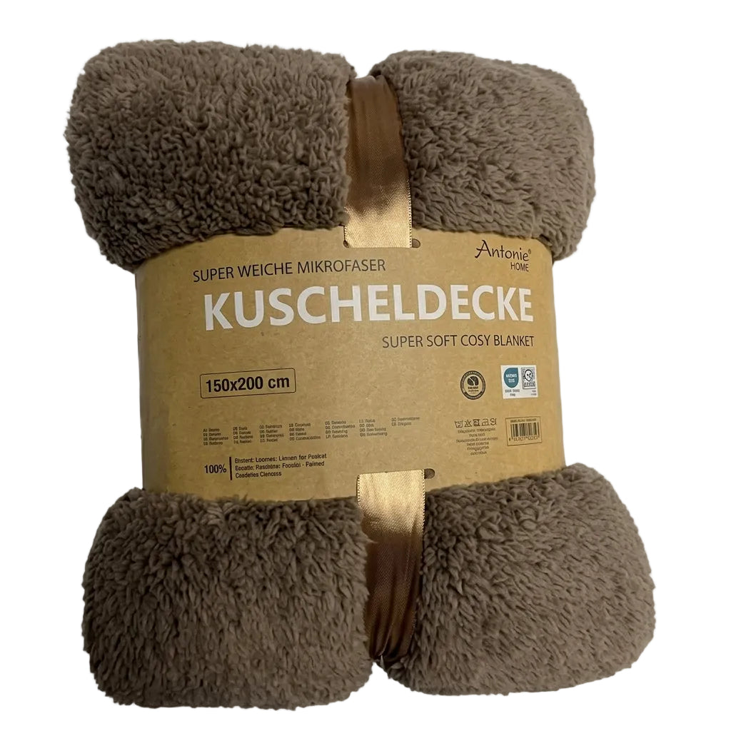 Bruine teddy deken van zachte microvezel 150x200 cm, opgerold verpakt en geschikt als warme plaid voor bank en bed